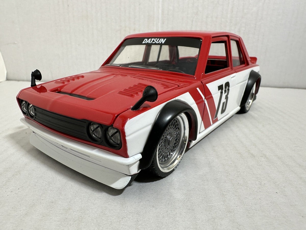 送料込み　JADATOYS 1:24 JDM TUNER 1973 Datsun Amazon.com: Jada Toys JDM Tuners 1:24 Scale Die-Cast 1973