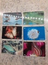 Lot (6) Singapore Telecom Used Phonecards