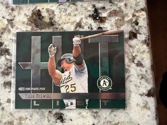 1997 DONRUSS MLB HIT LIST CARD OAKLAND ATHLETICS MARK MCGWIRE #413
