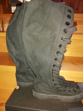 knee high converse boots with buckles and straps