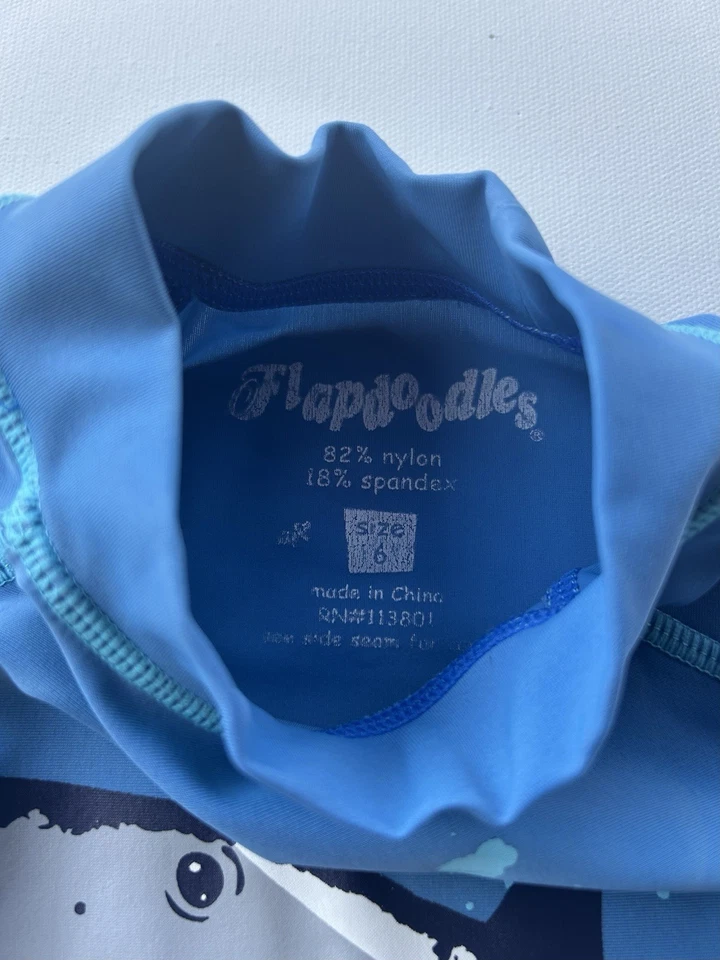 Protector contra erupciones Flapdoodles para niños talla 6. Foto 2 de 3