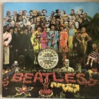 Beatles “Sgt. Peppers Lonely Hearts…” 1967.  Japan. Red Wax. OP-8163.