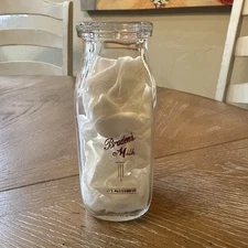 BRADEN'S HALF PINT MILK BOTTLE .  1952