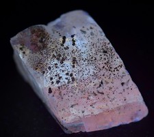 Calcite crystal with Pyrite crystals, fluorescent. Klein Quarry, Iowa. 45 grams.