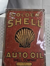 Golden Shell Auto Oil Tin Sign Metal by Decor is a decorative collectible New