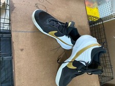 Size 6 GS - Nike Team Hustle D10 Low Black Metallic Gold