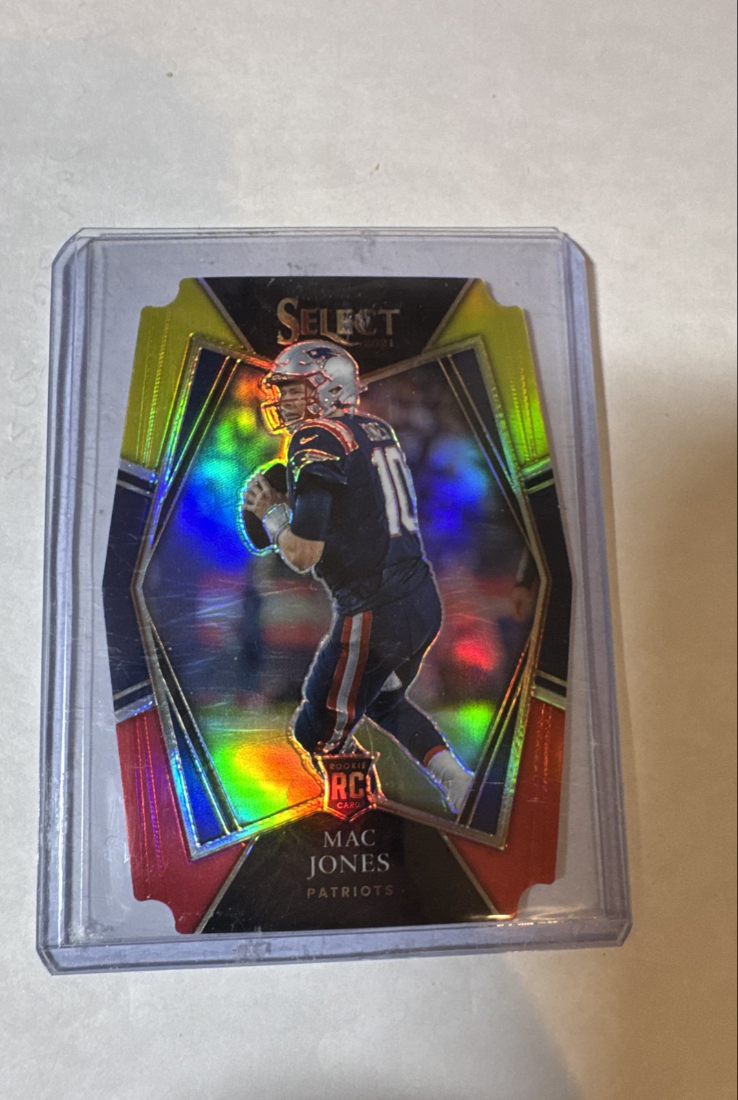 2021 Panini Select - Premier Level Mac Jones #151 Red & Yellow Prizm Die-Cut...