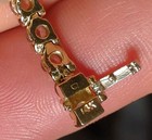 14K stamped tennis bracelet with white stones.  — photo 7