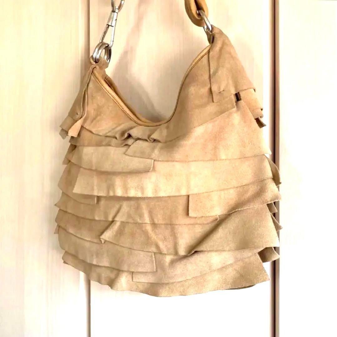 [Ecc+5] Borsa a tracolla Yves Saint Laurent Saint Tropez pelle scamosciata grana beige