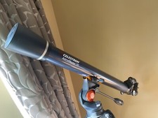 Black celestron astromaster 70 with Manuals and Stand
