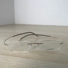 NWOT Silhouette 7577 20 6050 Eyeglasses Titan Brown Frames Only 49-19-140 7581