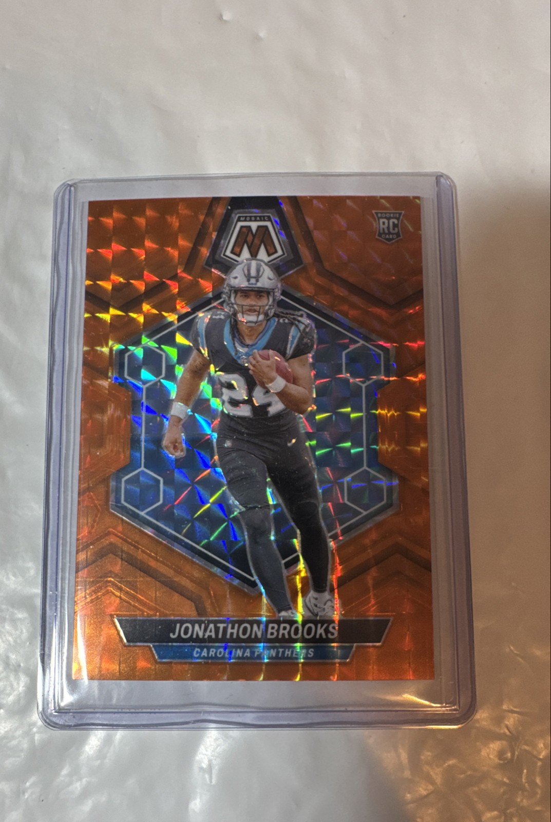 2024 Panini Mosaic - Rookies Jonathon Brooks #345 Orange Mosaic Prizm /199 (RC)