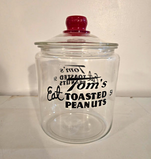 Tom's Toasted Peanuts Advertising Glass Candy Jar Canister w/ Red Lid
