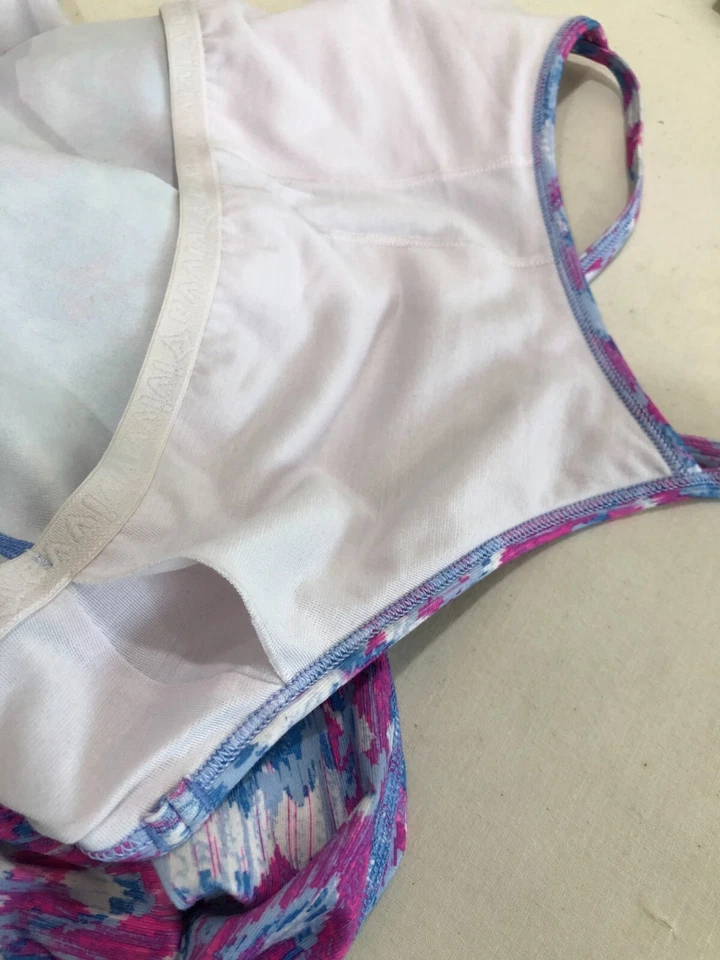 Conjunto Camiseta sin mangas y leggings Ivivva by Lululemon para niña talla 14 a juego estampado gráfico Foto 4 de 4