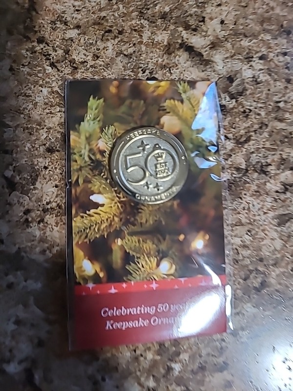2023 HALLMARK GOLD COLORED PIN CELEBRATING 50 YEARS OF KEEPSAKE ORNAMENTS CLUB. 