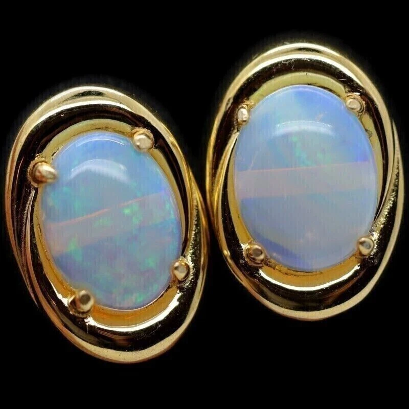 Aretes solitarios de ópalo de fuego natural de 2,10 quilates enchapados en oro amarillo de 14 k Foto 4 de 4