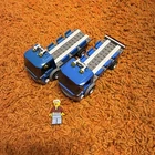 LEGO City lot of 2 harbor crate trucks with driver. Sold as is.