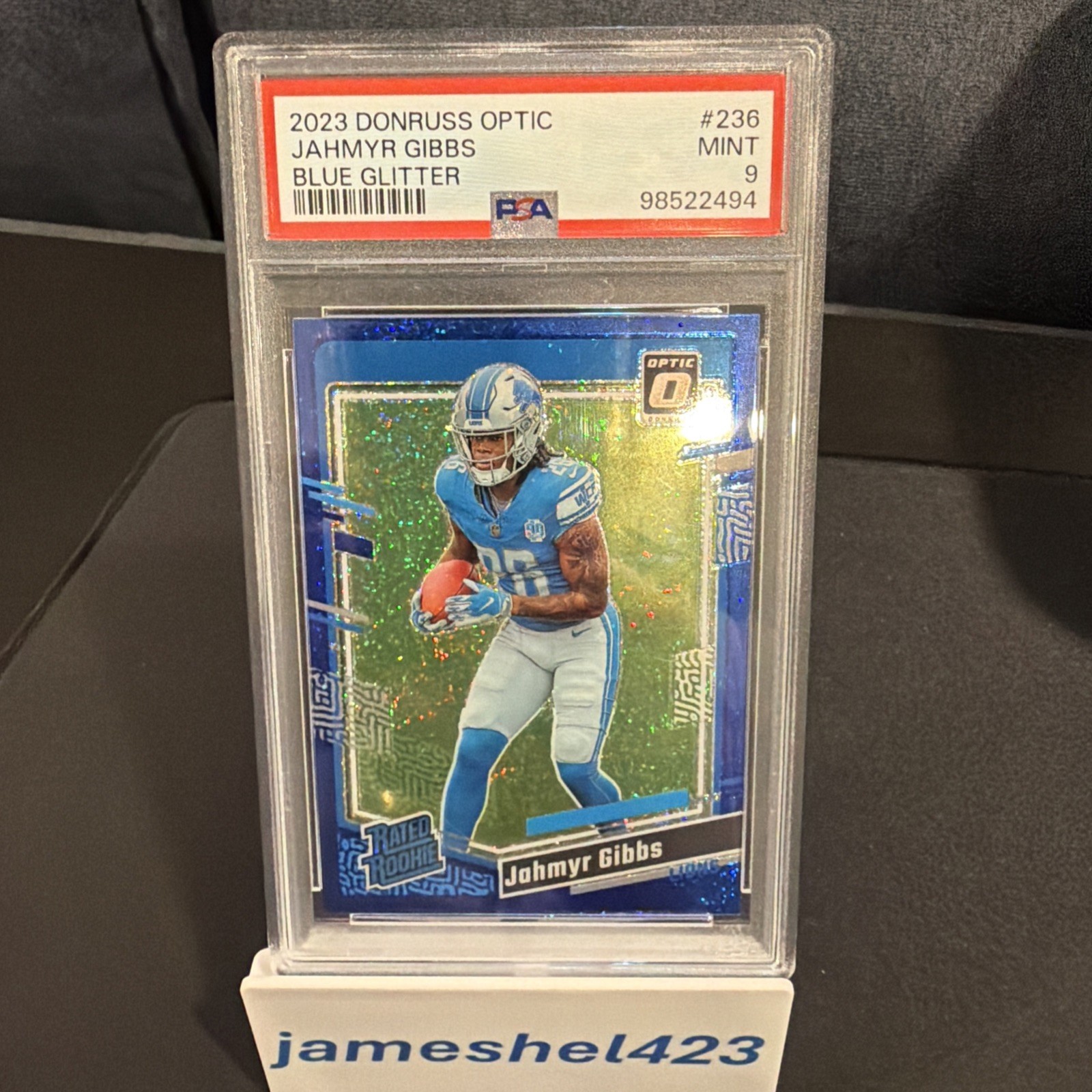 2023 Panini Donruss Optic - Rated Rookie Jahmyr Gibbs #236 Blue Glitter Prizm