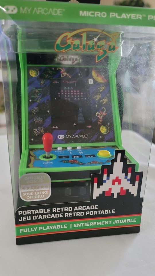 A palm-sized fully playable Galaga arcade cabinet — the My Arcade Micro Player is a delightful desk toy that actually works and triggers instant nostalgia.