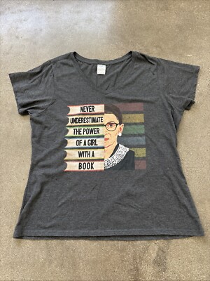 Never under estimate the power of a girl w/ a book t-shit XXL