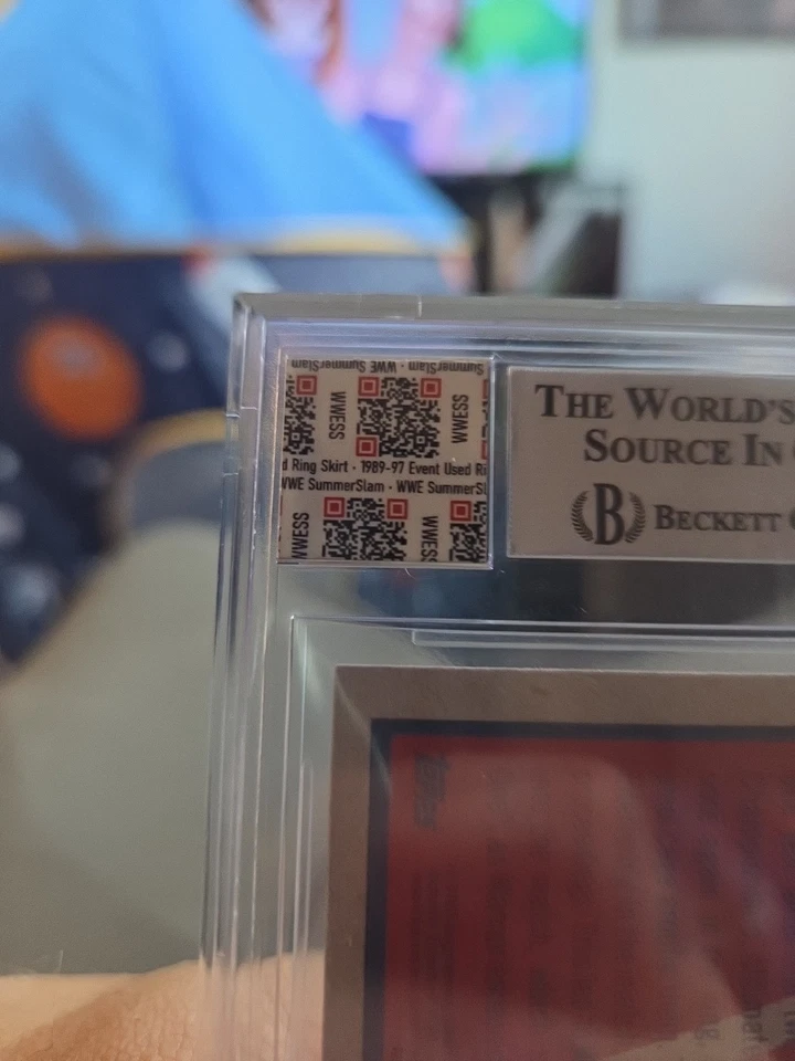 Rare 2017 Topps WWE Beckett 9 Summerslam  Ultimate Warrior 1992 Ring Skirt Used - Image 3 of 3