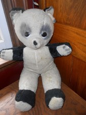 ANTIQUE LARGE BLACK AND WHITE STRAW FILLED TEDDY BEAR