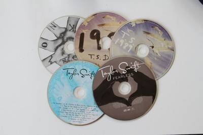 Taylor Swift CD Set - unsure if working, some scratched