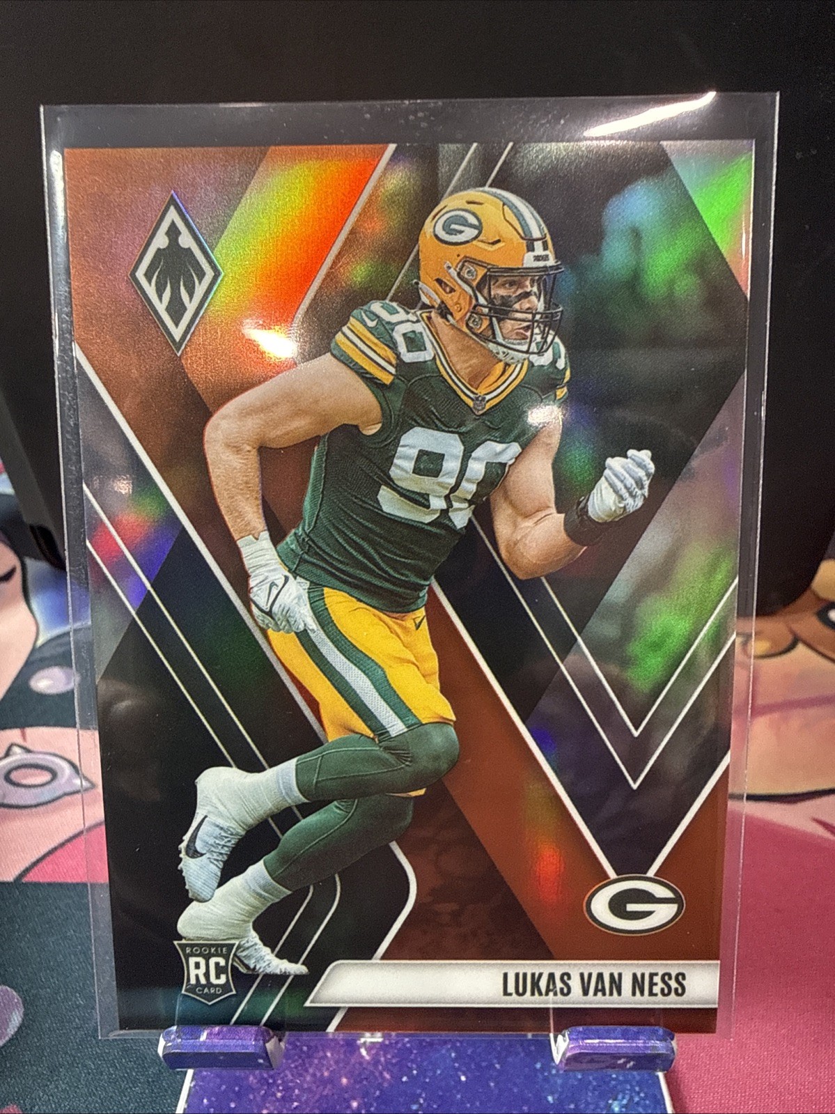 2023 Panini Phoenix - Rookies Lukas Van Ness #146 Orange Seismic /99 (RC)