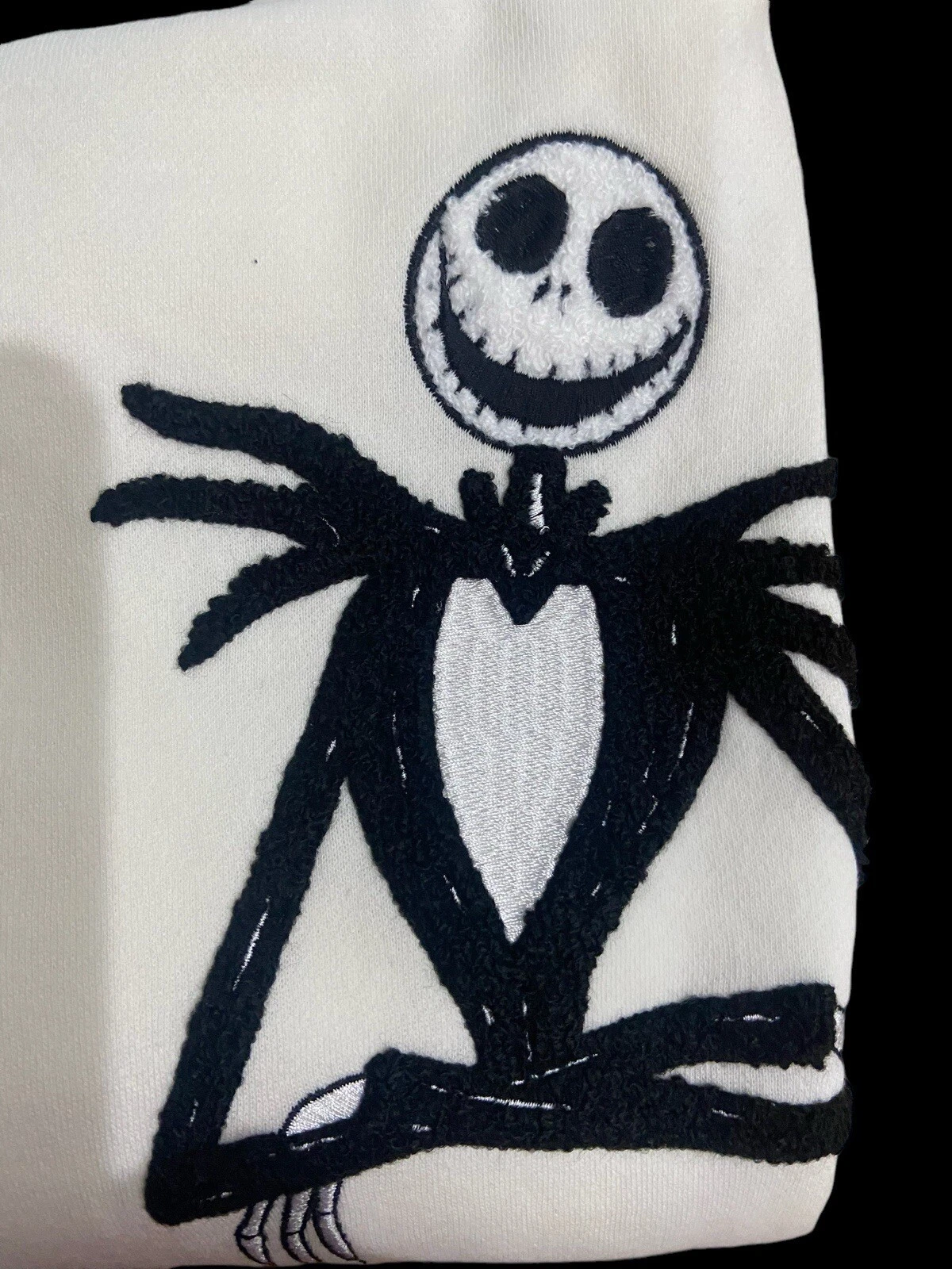 OFF WHITE FELPA CON CAPPUCCIO ZIP NUOVA CON ETICHETTE XL NIGHTMARE BEFORE CHRISTMAS JACK SKELLINGTON DISNEY con TOPPE