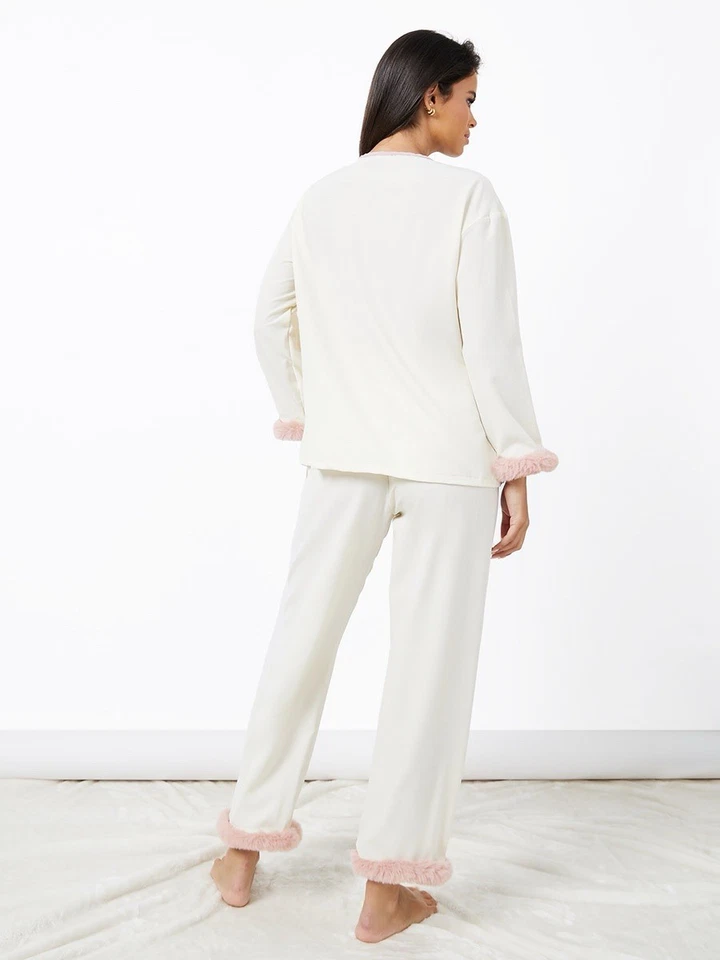 Pantalones de pijama de piel sintética con borde de tubo talla L Foto 3 de 4