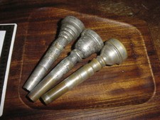 THREE VINTAGE TRUMPET MOUTHPIECE S ONE EZ TONE  ONE ALL STAR ONE UNMARKED