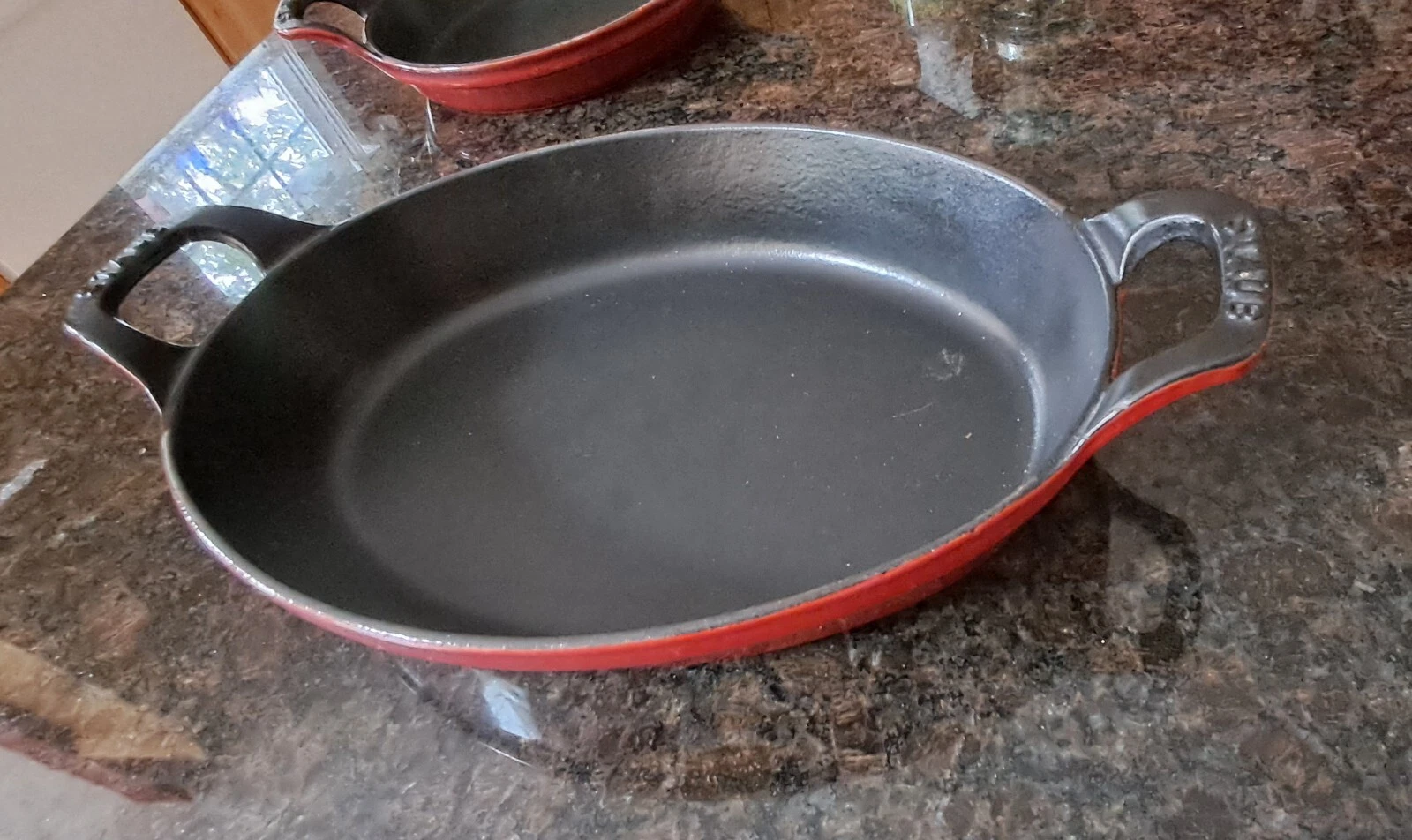 Staub Cast Iron 12 1/4 inch x 8 1/4vinch Oval Baking Dish - Cherry Red