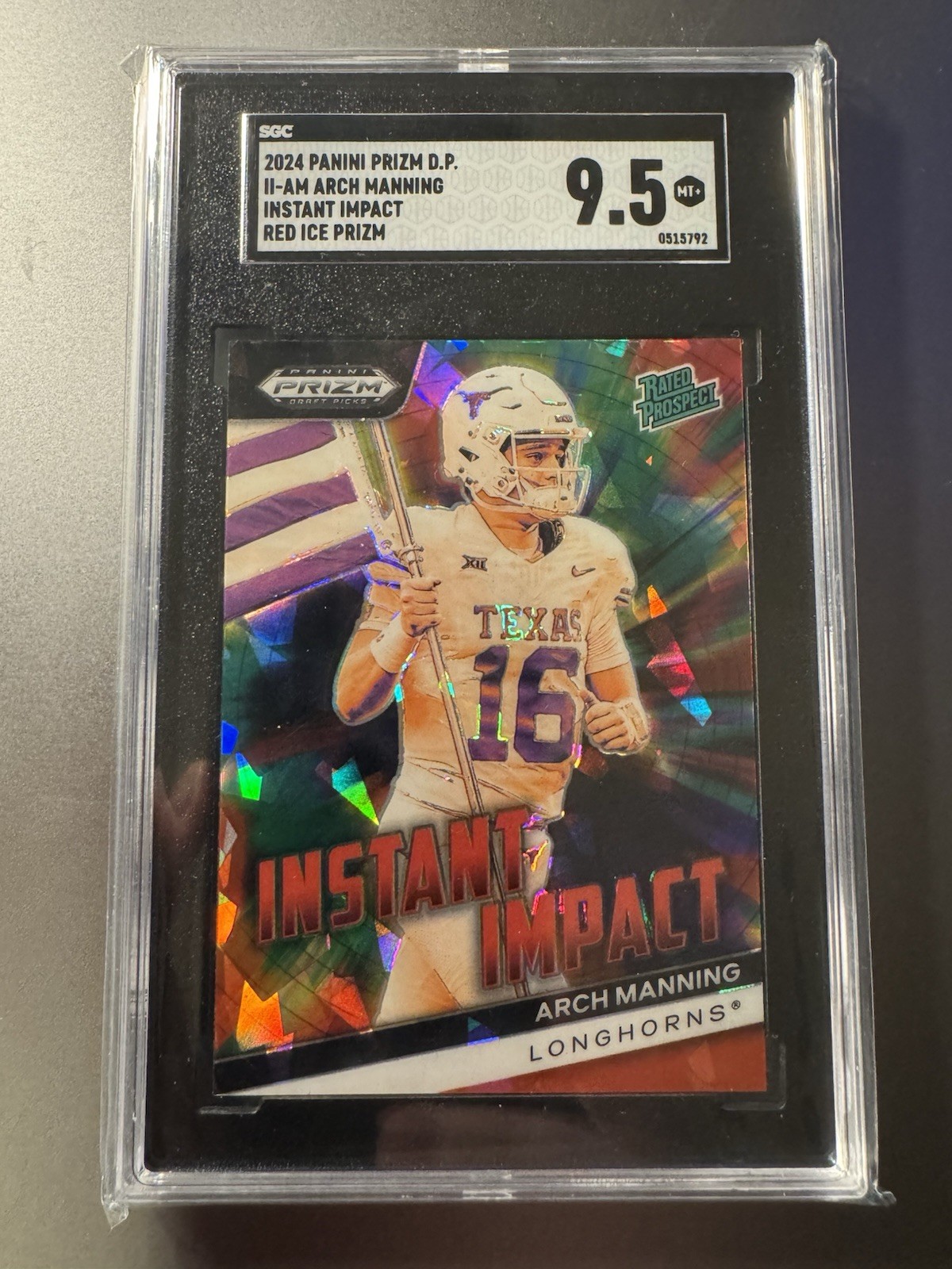2024 Prizm Draft Picks Instant Impact Arch Manning #II-AM Green Holo SGC 9.5
