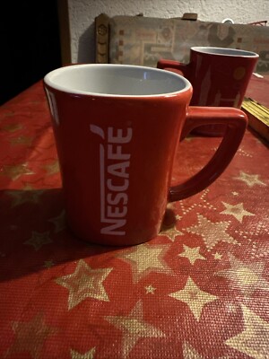 1 x Kaffeebecher Nescafe'' rot mit Aufschrift,Druck 9 cm,200 ml Paris oder London