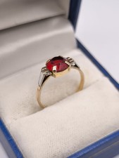 Bague en plaqué or FIX époque ou style Art Déco sertie d'une pierre rouge