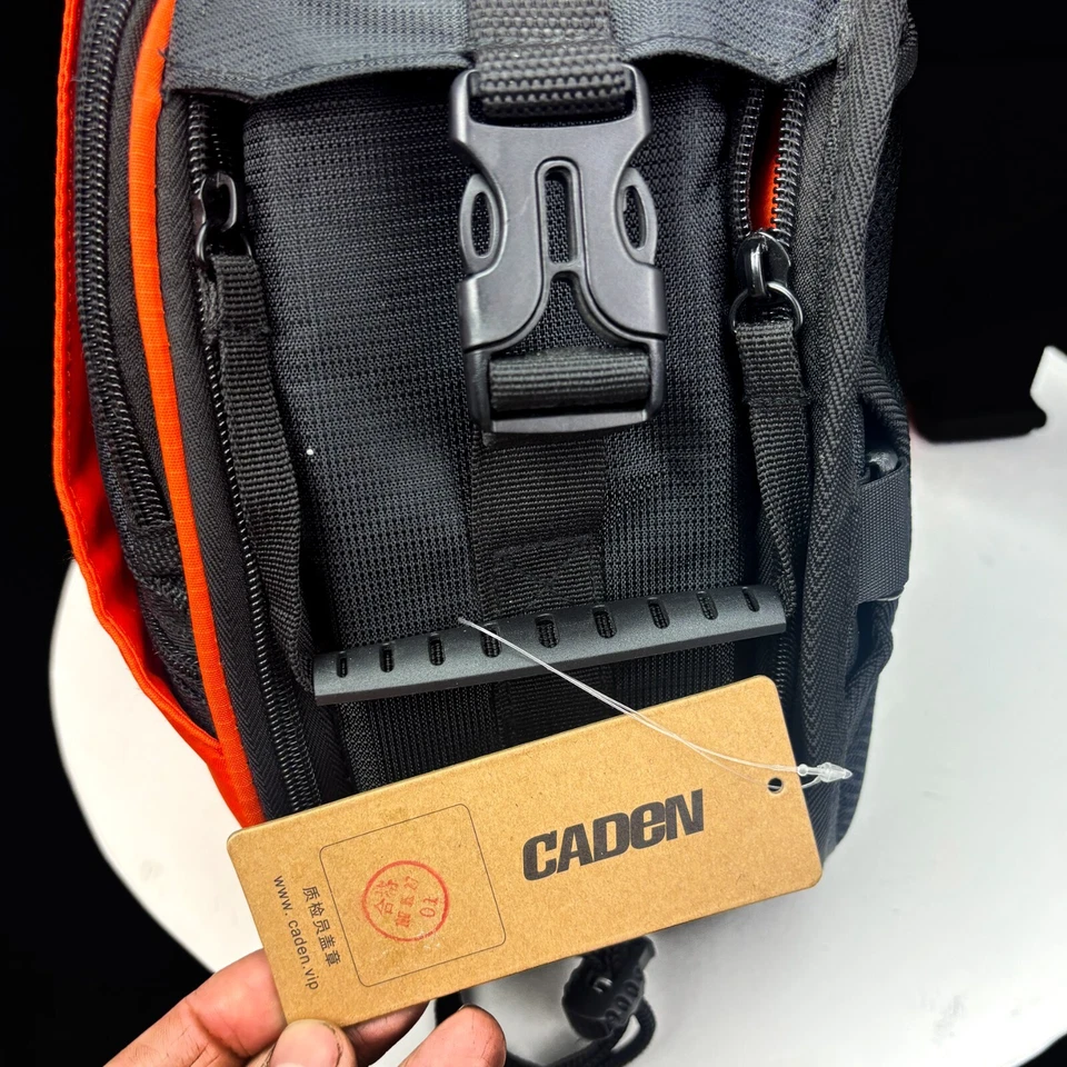 Bolso Bandolera Caden Naranja Negro Cámara Correas Ajustables Trípode Lazos Eslinga Foto 3 de 4