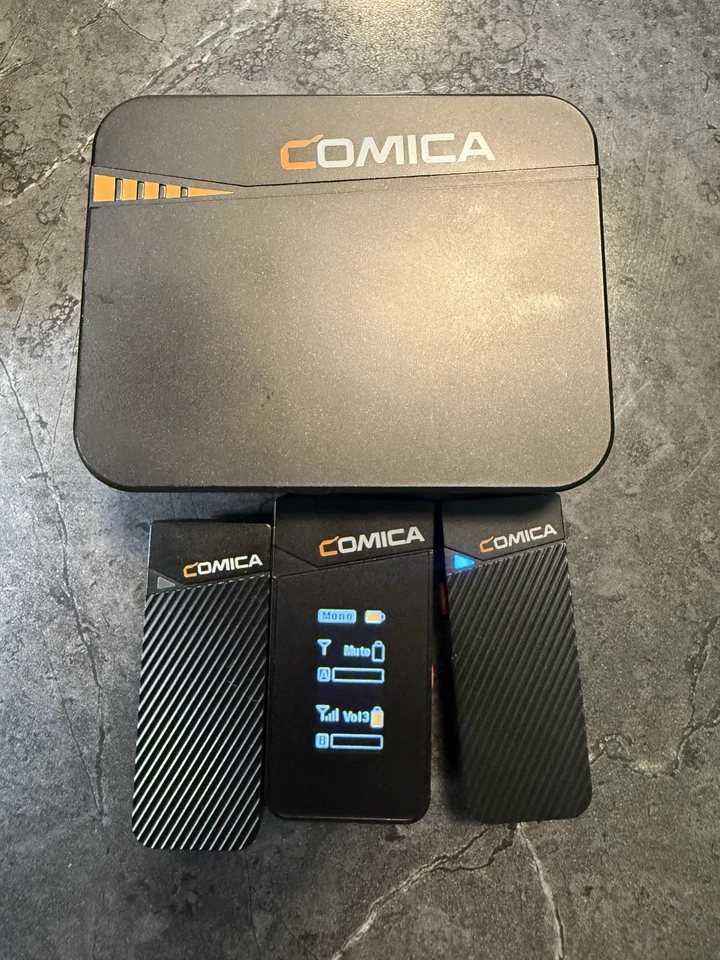 Kit de caja de carga micrófono cámara inalámbrico doble canal Comica Vimo C C3 2,4 g Foto 2 de 3