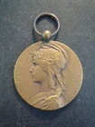 Médaille en bronze signée A. Rivet