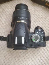 Nikon D 3100 With Extended Lens And Nikon Strap