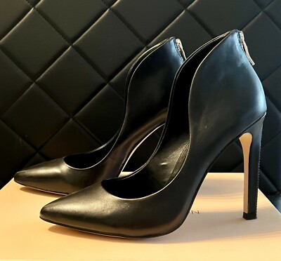 BCBG generation leather heels with zipper on the back of heels size 6M 