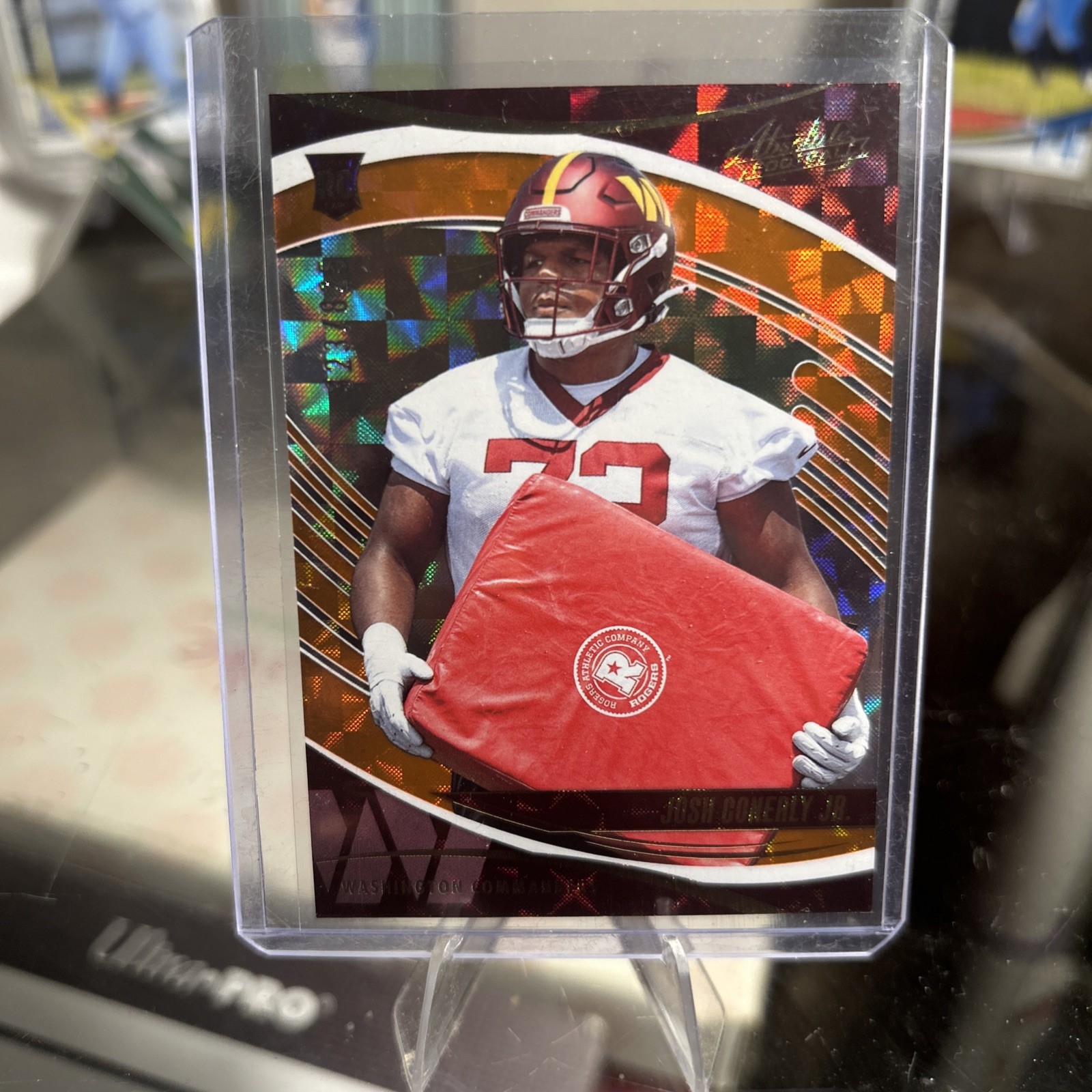 2025 Panini Absolute - Rookies Josh Conerly Jr. #145 Orange Mosaic /825 (RC)