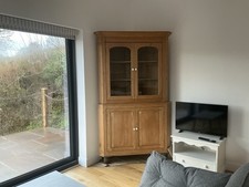 VINTAGE STRIPPED PINE GLAZED CORNER CUPBOARD