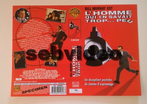 JAQUETTE VHS - WARNER - L'HOMME QUI EN SAVAIT TROP PEU (1997) ** RECTO