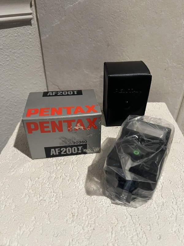 NIB Pentax AF200T Shoe Mount Flash. Manufactured Asahi Optical Co. Ltd. in Japan