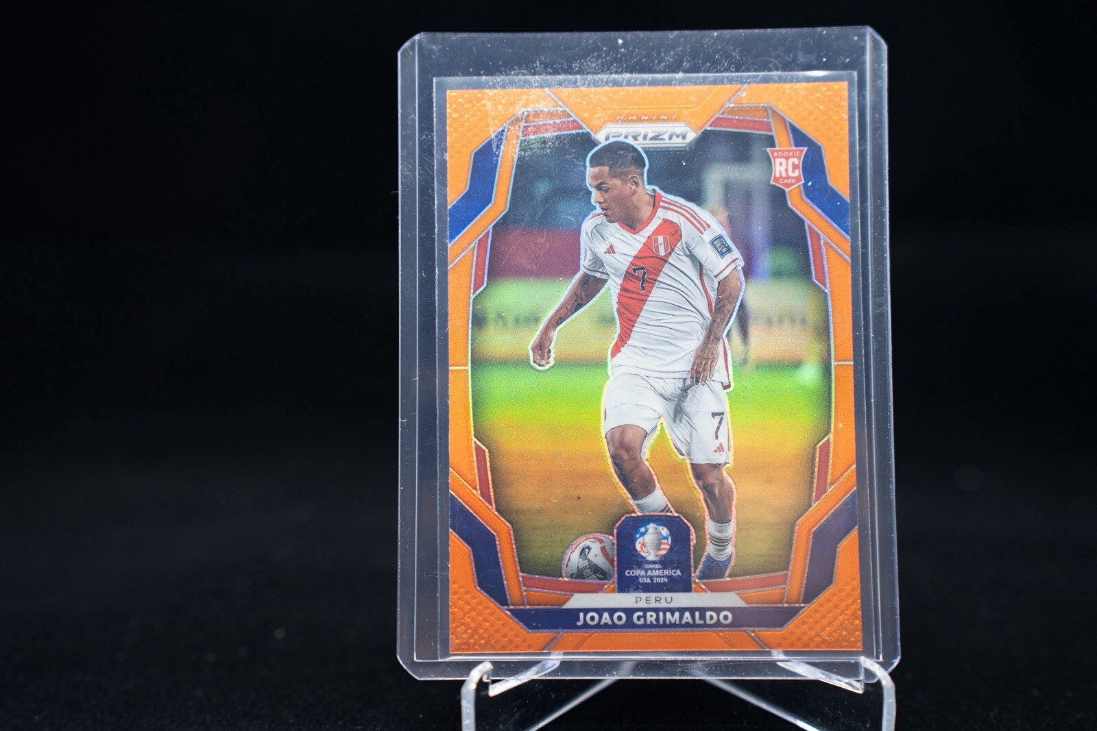 2024 Panini Copa America Prizm Joao Grimaldo Orange Prizm #/25 Peru