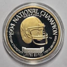 1994 NEBRASKA NATIONAL CHAMPION 24KT GOLD SELECT 1 TROY OZ .999 FINE SILVER COIN