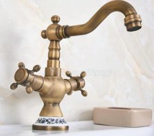 Antique Brass Swivel Spout Bathroom Basin Faucet Double Handles Sink Mixer Tap