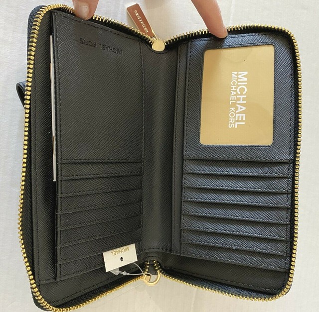 Michael Kors Jet Set Travel Wallet /phone Holder in Black and Gold for