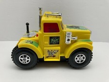 WWF 2000 X-Pac Tumble Truck Battery Operated Yellow Semi Rig Toy WWE 7"