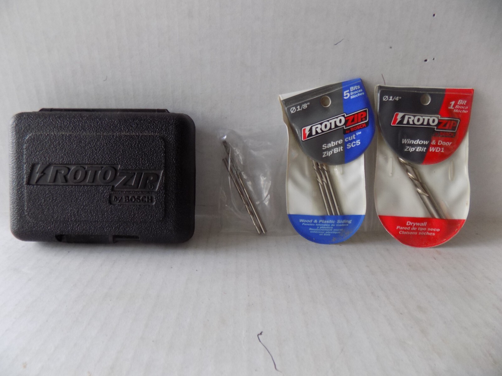 (6) TOTAL ROTO ZIP 1/8" AND 1/4" SHANKS AND CARRY CASE BY BOSCH PO